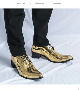 Detail of men's pointed-toe gold shoes with embossed paisley patterns and thick heels