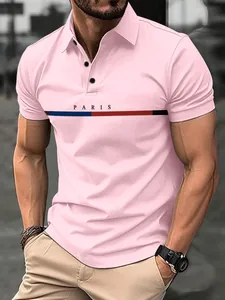 Polo rosa entallado para hombre con estampado de París y franja tricolor