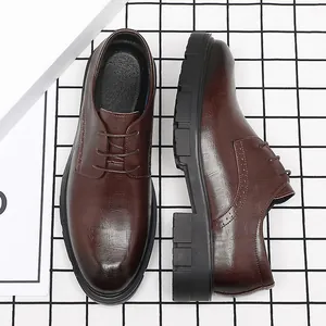 Men's brown leather business dress shoes with thick platform soles and elevator design.