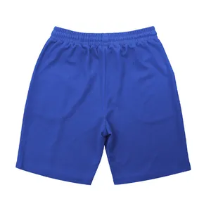 Close-up view of men's blue waffle-knit casual shorts featuring a comfortable elastic waistband