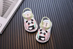 Detail shot of pink toddler sandals featuring a cute 3D panda cartoon and soft white soles
