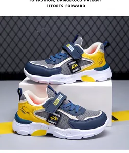 Lightweight boys' mesh sneakers with blue and yellow accents for casual running