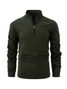 Close-up of men's olive green long sleeve shirt with unique pleated shoulder details.