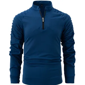 Detail view of a navy blue men's quarter-zip sweatshirt featuring pleated shoulder texture