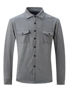 Detail of a premium men's grey faux suede casual jacket featuring flap chest pockets.