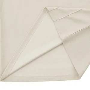 Close-up detail showing the premium waffle knit fabric texture and neat stitching.