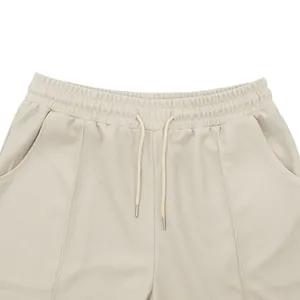 Detail view of men's waffle knit shorts featuring a comfortable elastic drawstring waist
