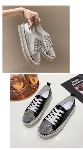 Detail of women's rhinestone platform sneakers with thick sole and lace-up design