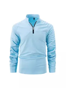 Men's light blue long-sleeve quarter-zip sports shirt with pleated sleeve design