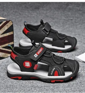 Close-up of black and red children's closed-toe outdoor sports sandals.
