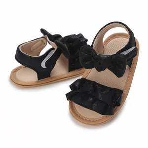 Black baby walking sandals with soft soles and bow ruffles for infants 0-1 year old