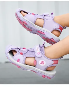 Detailed view of purple children's beach sandals with protective toe cap and mesh fabric