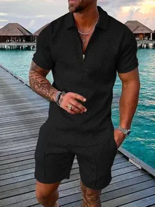 Men's casual black two-piece set with polo shirt and shorts in geometric texture