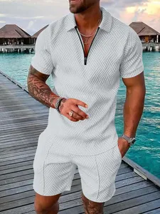 Men's white summer set featuring a geometric textured zip polo shirt and matching shorts