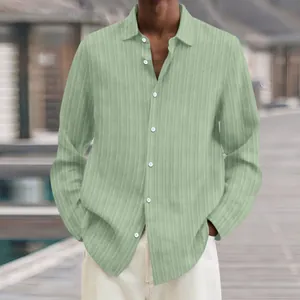 Detailed view of light green ribbed fabric on a casual long-sleeved men's shirt