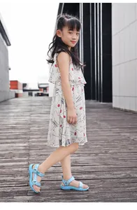 Stylish blue girls' summer woven sandals with butterfly detail and adjustable velcro straps