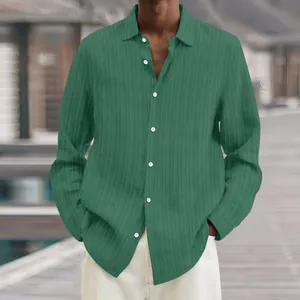 Close-up detail of green men's casual shirt featuring elegant vertical rib texture
