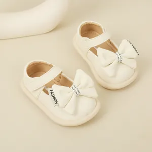 Elegant cream baby girl Mary Jane shoes with soft anti-slip soles and big decorative bows