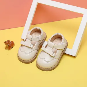Beige baby girl princess dress shoes with bow detail for toddlers