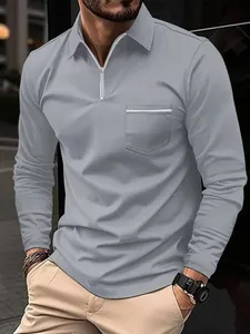 Casual men's grey long-sleeved polo shirt featuring zipper neck and stylish chest pocket
