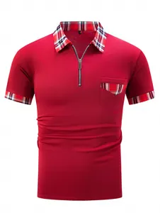 Detailansicht eines roten Herren-Poloshirts mit Karokragen, Reißverschluss und Brusttasche