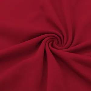 Detailed view of breathable dark red quick-dry fabric texture for men's polo shirt