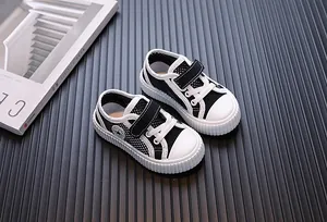 Breathable black and white mesh sneakers for toddlers with velcro strap