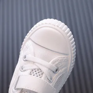 Breathable white mesh children's sneakers for toddlers with a secure velcro strap