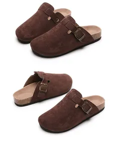 Dark brown suede clogs with adjustable buckles and cork soles for casual daily wear