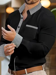 Detail of men's casual black shirt with stylish houndstooth patchwork on collar and cuffs