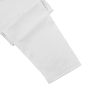 Detailed close-up of white cotton long sleeve cuff showing high-quality stitching