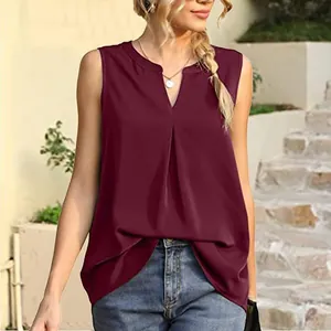 Detail of wine red V-neck sleeveless tank top with front pleats and loose casual fit.