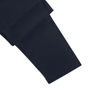 Detail view of navy blue long sleeve knit T-shirt cuff with double-needle stitching.