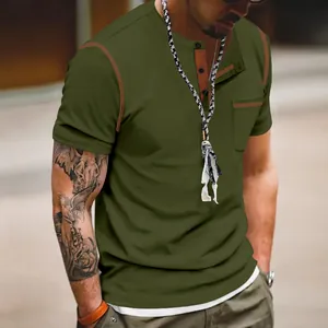 Detailed view of olive green short sleeve Henley shirt with button placket and pocket
