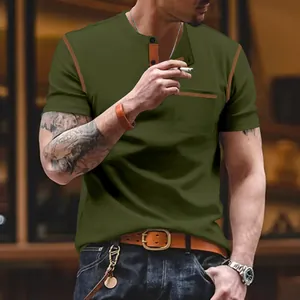 Close-up of olive green Henley T-shirt with contrast stitching and chest pocket