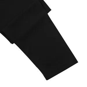 Close-up detail of the sleeve cuff on a black long sleeve knitted Henley shirt