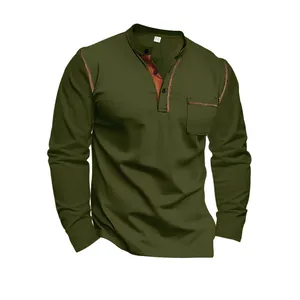 Detail of olive green long-sleeved Henley shirt with contrast stitching and pocket