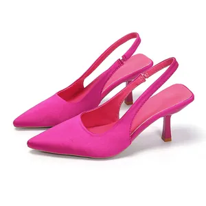Side view of elegant magenta pointed-toe slingback kitten heels with satin finish