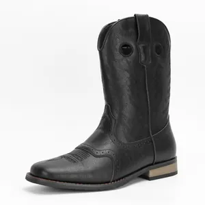 Side view of black men's cowboy boot with intricate vintage embroidery detail