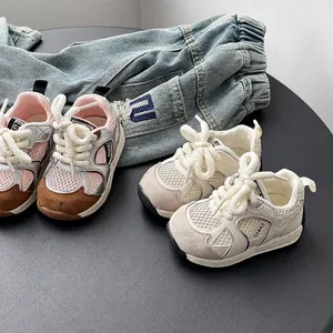 Breathable mesh sneakers for toddlers and babies with soft soles, perfect for walking.