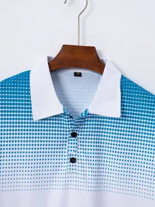 Close-up of men's polo shirt showing white lapel and blue dot print detail