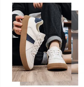 Gedetailleerd overzicht van heren GAT-sneakers van echt leer met rubberen zool en strips.