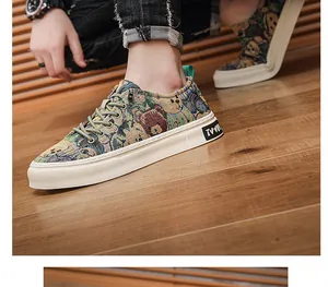 Close-up of stylish men's canvas sneakers featuring a colorful cartoon bear pattern detail