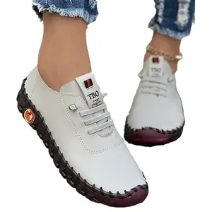 Handmade women's casual loafers with soft red rubber sole and grey leather finish