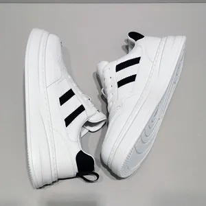 Men's genuine leather platform sneakers featuring bold black diagonal stripes and thick sole