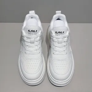 Front view of white casual leather sneakers for men with thick sole and breathable design
