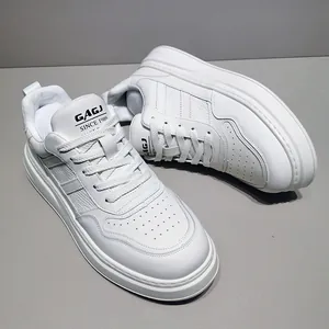Detailed view of white men's casual leather board shoes with breathable thick soles