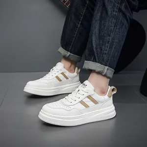 Men's white leather casual sneakers with stylish brown stripes and thick platform sole.