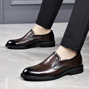 Elegant men's brown embossed leather business shoes with slip-on design and pointed toe