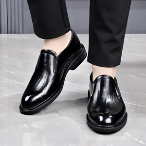 Elegant black embossed leather formal slip-on shoes for men in a professional business style